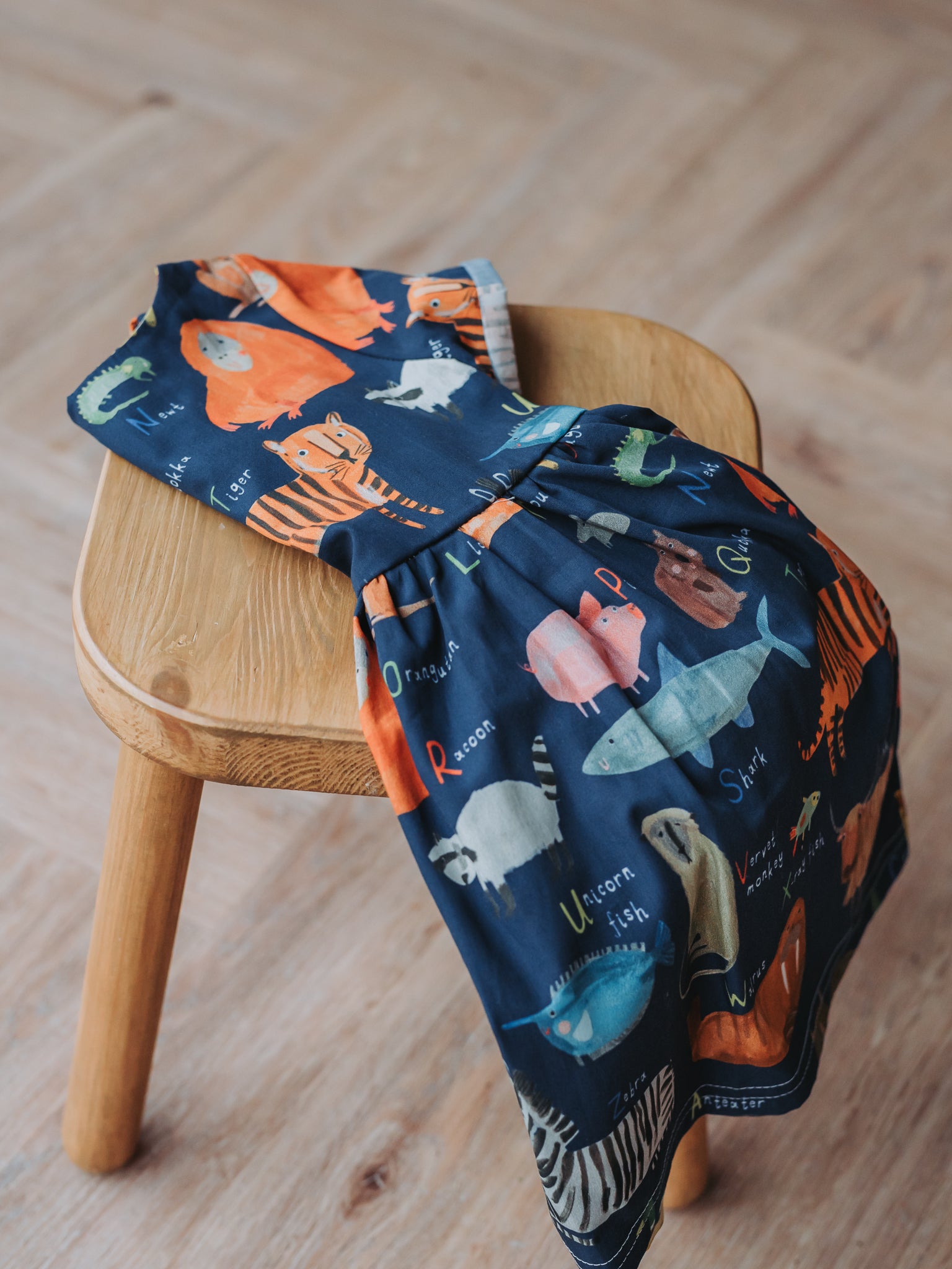 Cotton Sun Dress with twist back detail - AlphaZoo Navy