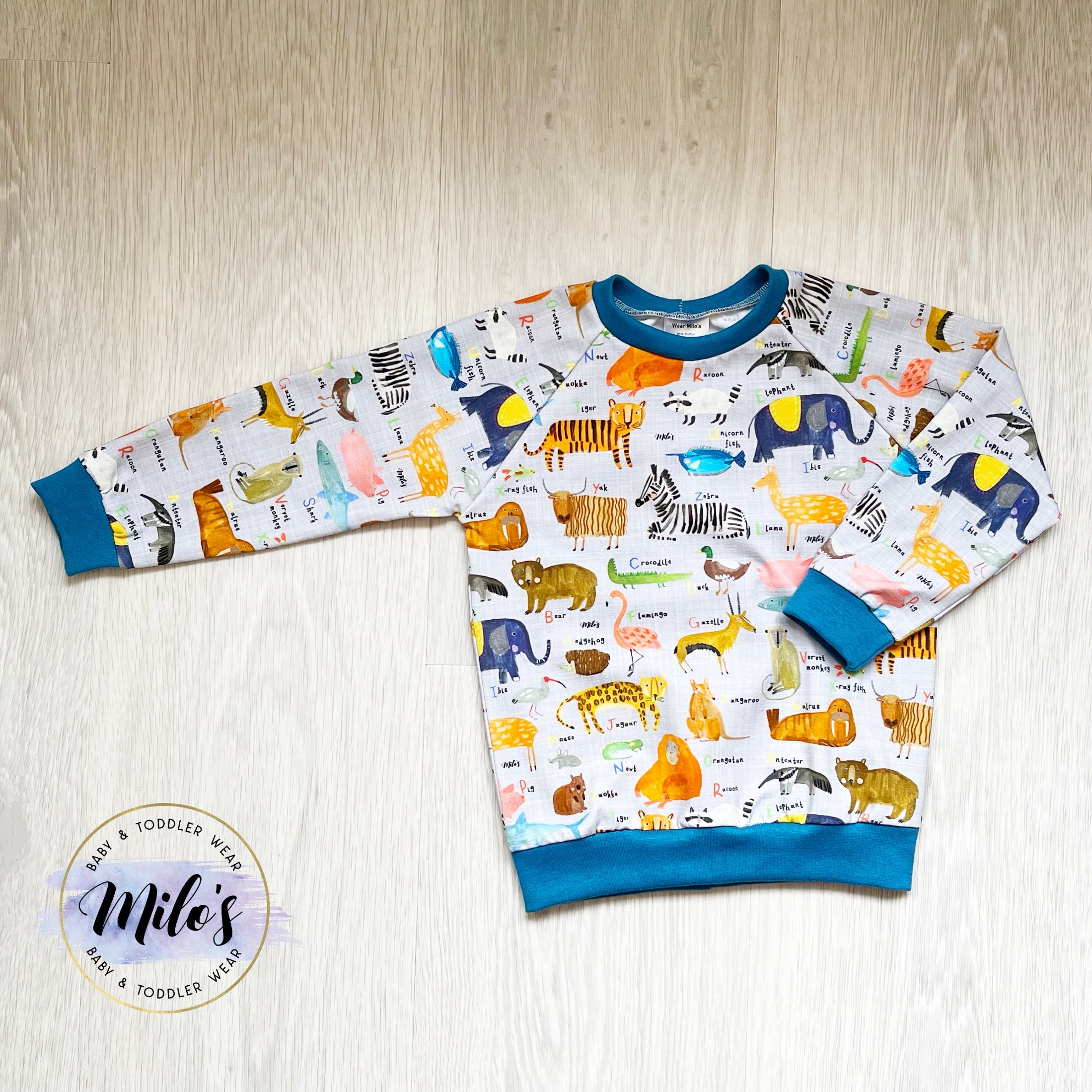 AlphaZooGreySweater_578ac257-ac45-428b-bc69-382ec71e2c14.jpg